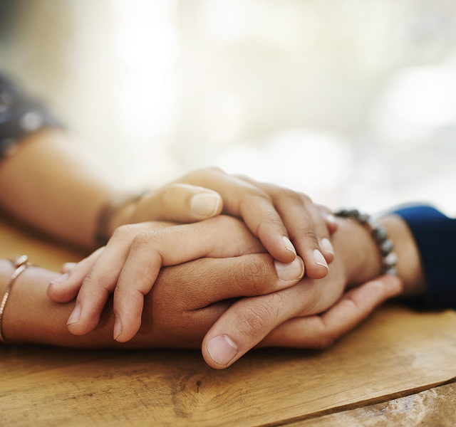 two hands holding