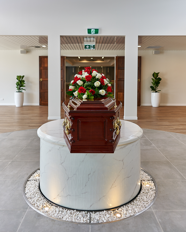 coffin in foyer of funeral home
