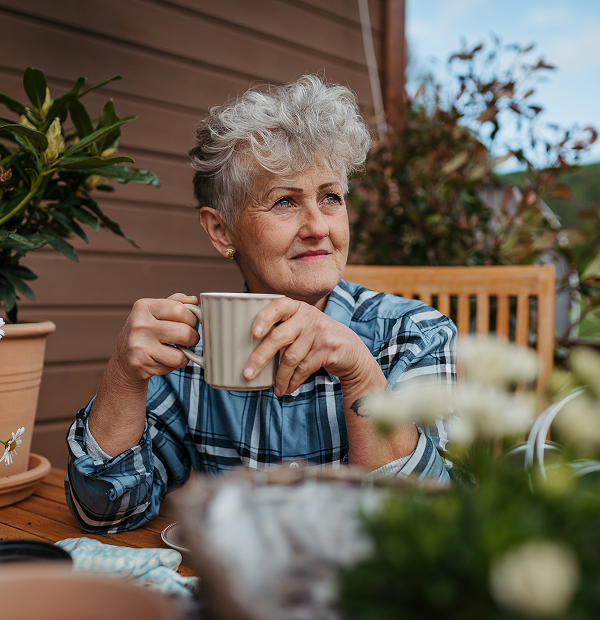 older woman enjoying a coffee