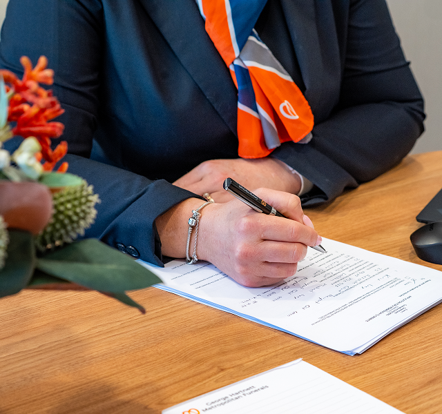 funeral director taking care of paper work