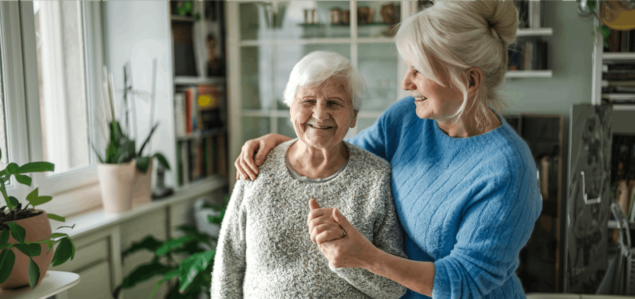 daughter helping elderly mother