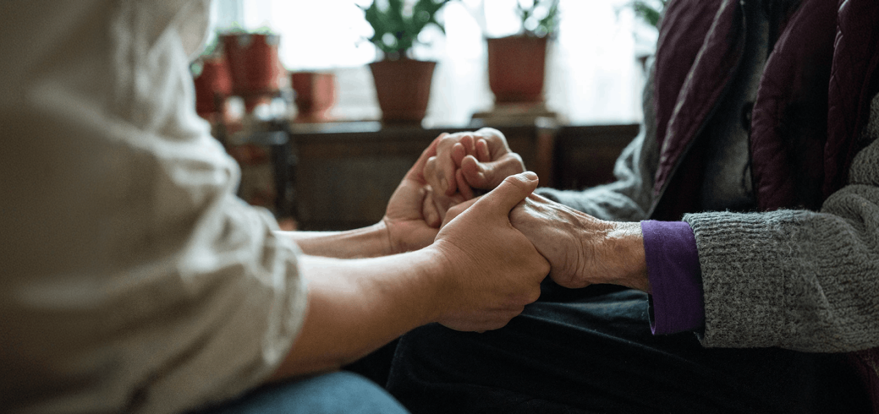 two people holding hands